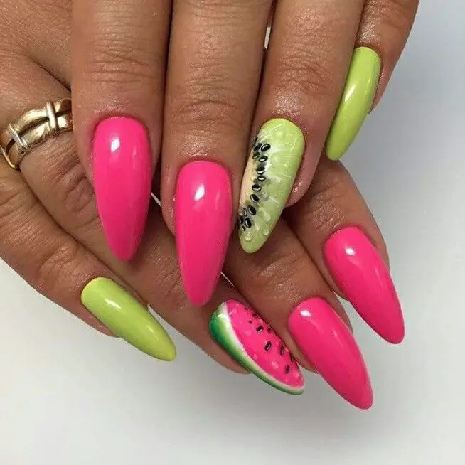 Flaunting hot pink and zesty lime hues, these almond nails with watermelon and kiwi designs are a bold celebration of summer fun