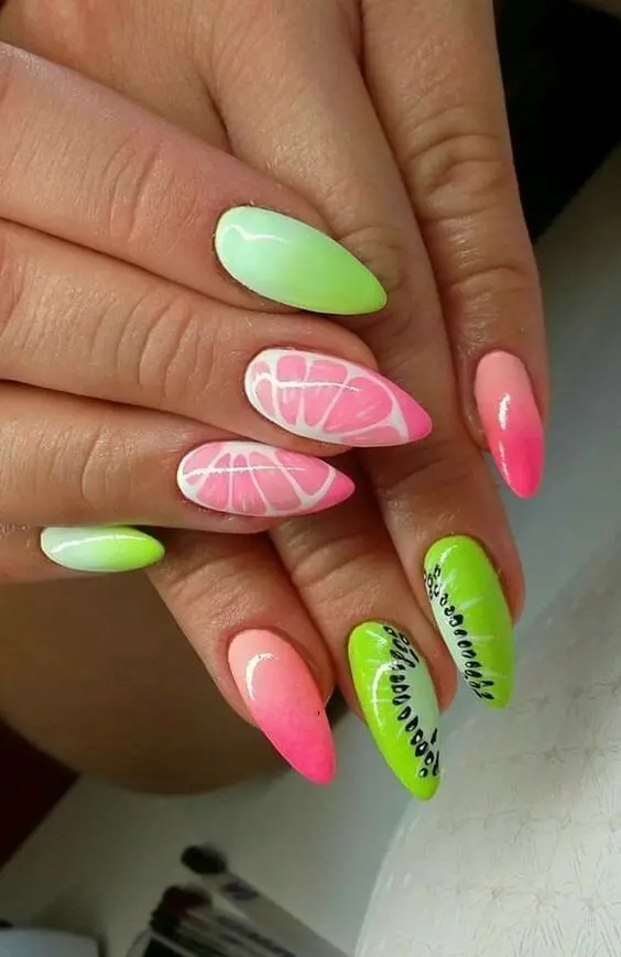 Mixing neon pink and bright lime, these nails are a summer festival of citrus and watermelon, perfect for beach parties and sunny days.