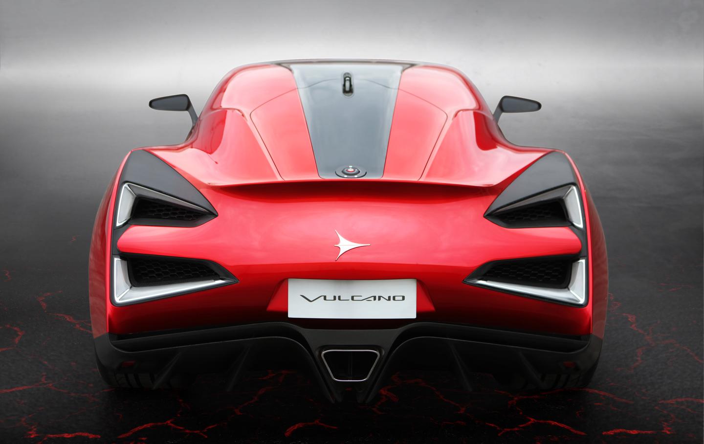 Fluid, sensual lines taper down the narrowing roofline to an integrated rear spoiler