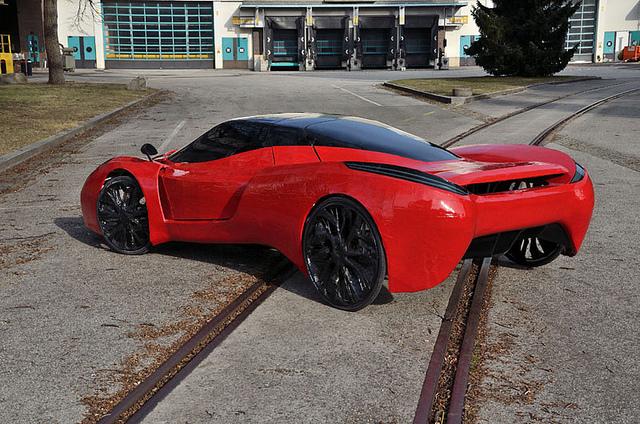 The front-end looks very similar to the Enzo or FXX, but the rear takes us in a different direction