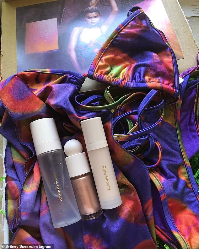 So many goodies: The box contained a tie-dye bikini and her three 'favourite make-up products' from Selena's Rare beauty range